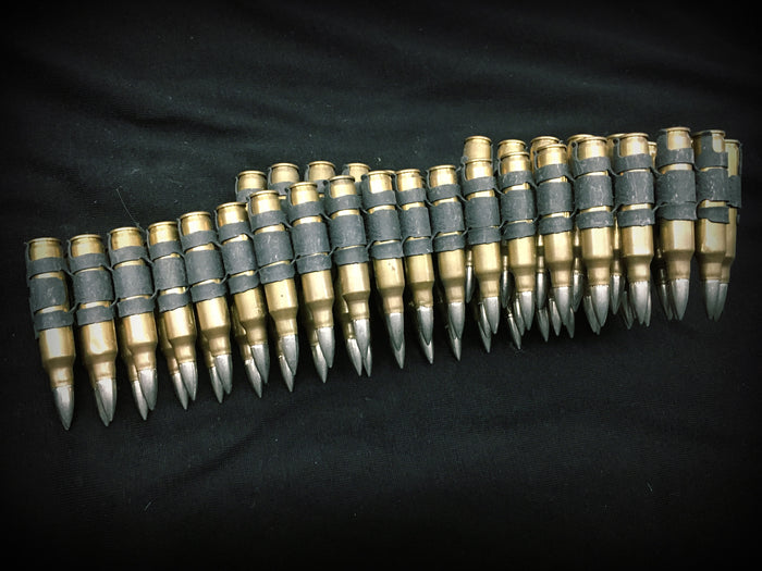 .223 brass bullet belt with nickel plated tips and black links