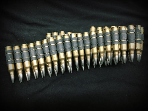 .223 brass bullet belt with nickel plated tips and black links