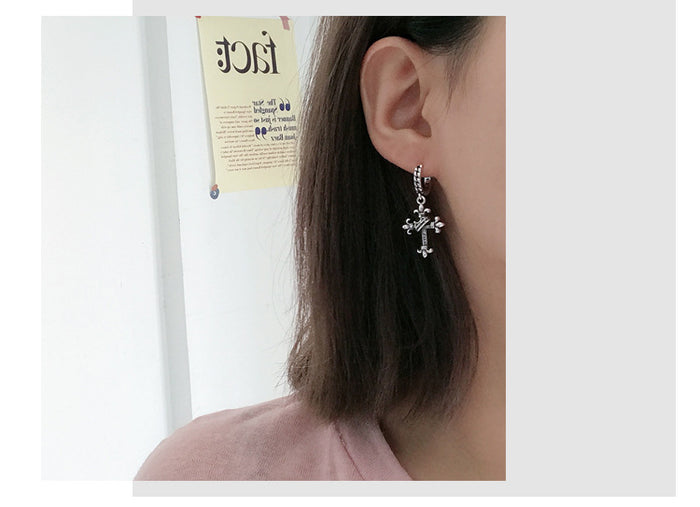 model wearing earring