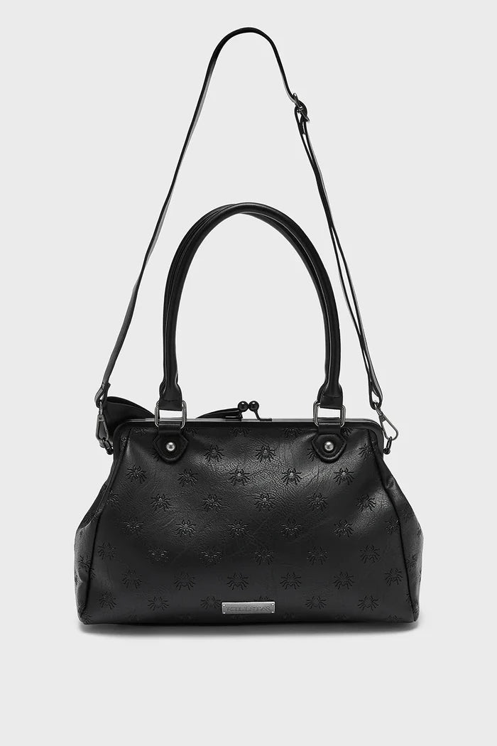 Black handbag with embossed spider pattern on a white background