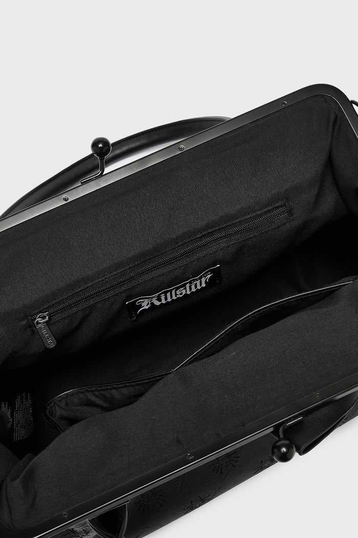 inside of handbag showcasing killstar logo
