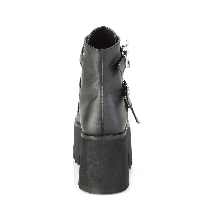 back side view black unisex vegan leather chunky 3.5 inch heel ankle boot, with three straps, bat buckles and silver tree spikes across straps