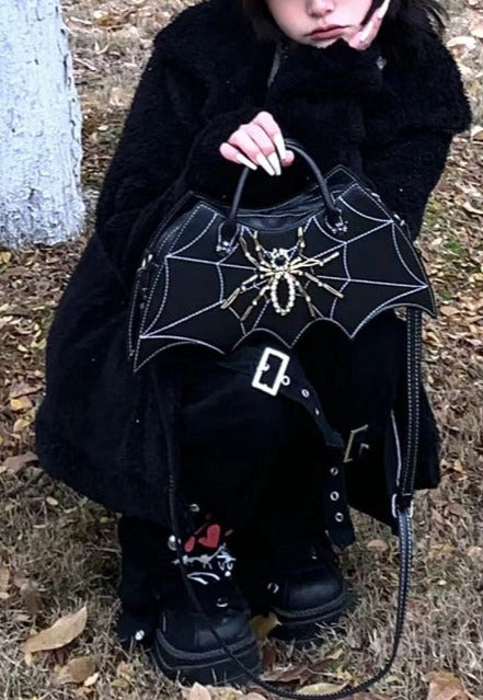model holding purse