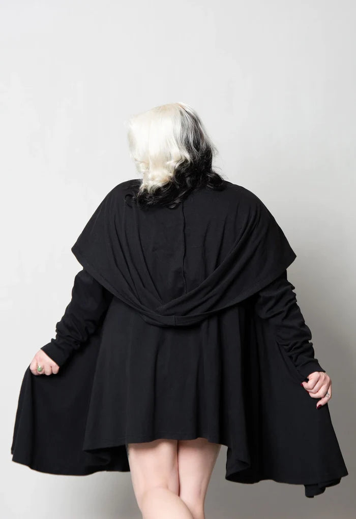model showing back of cardigan