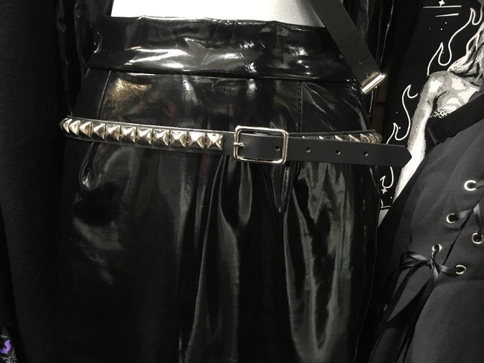 black leather belt with single row of multiple silver pyramid studs