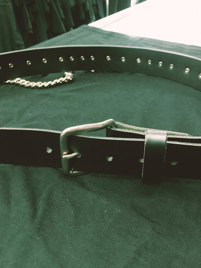 black bondage belt with silver hanging o rings and silver hanging chain