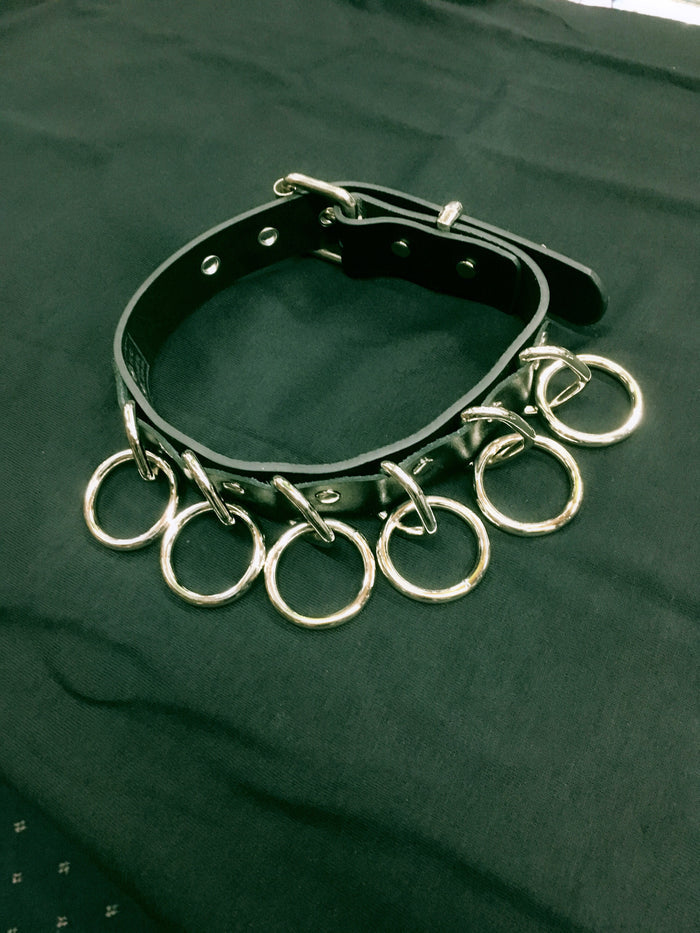 black collar with large silver hanging o rings