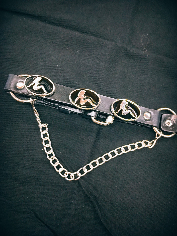 Three mudflap girl silver and black metal pins, with hanging chain and adjustable buckle closure