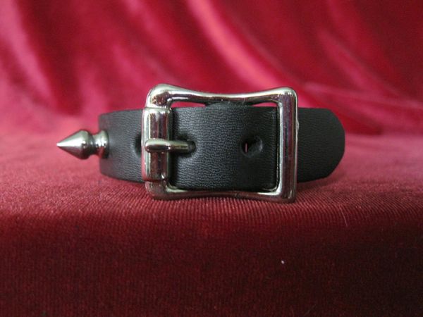 black leather bracelet with multiple silver spike studs