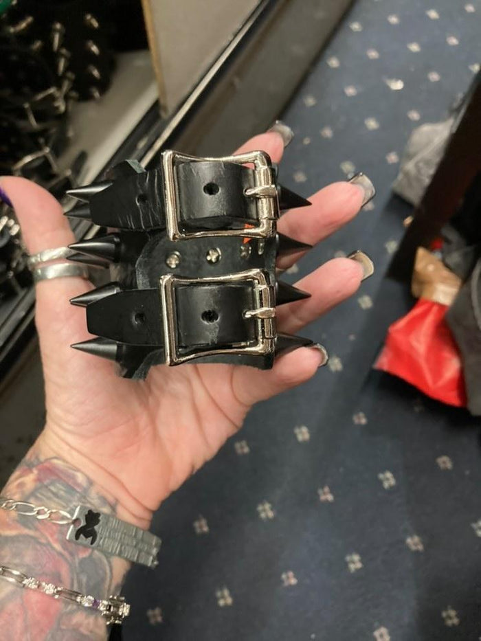 Four row black cone spike bracelet