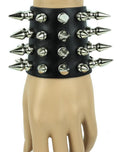 Black leather bracelet with four rows of 1" spikes, four rows of 1/2" spikes.
