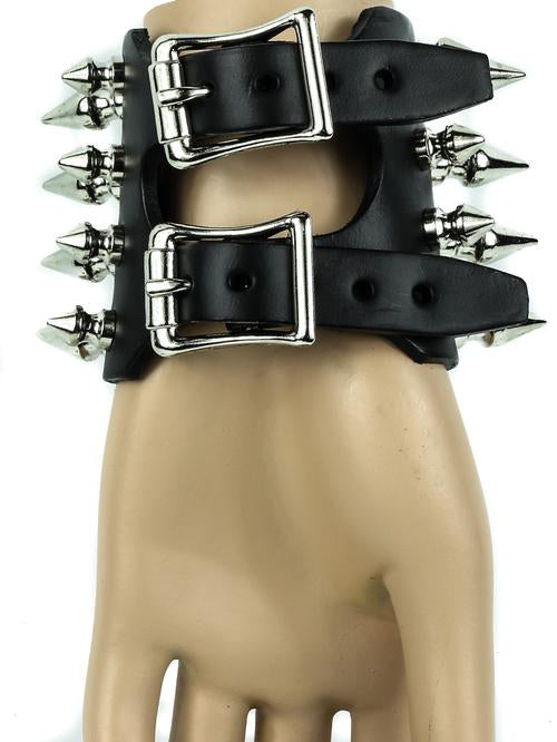 Black leather bracelet with four rows of 1" spikes, four rows of 1/2" spikes.