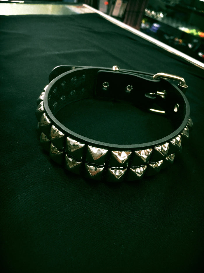 black leather collar with two rows of silver pyramid studs