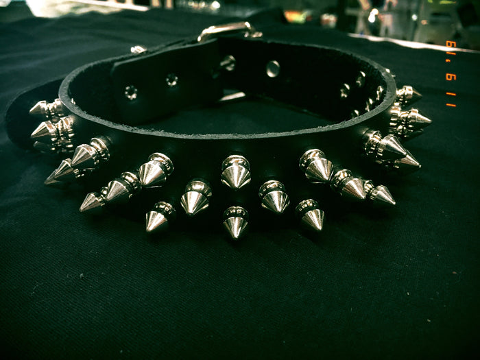 Black leather collar with three rows of silver 1/2" tree spikes.