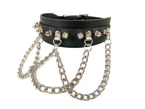 Black leather collar with silver spikes and small silver D rings with attached silver hanging looped chains.
