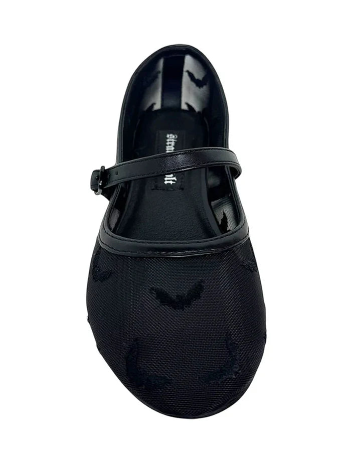 front of shoes on display