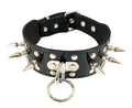Black patent leather shiny collar with silver spikes, silver rivet studs, and 1" silver O ring hanging from a silver D ring in front center.