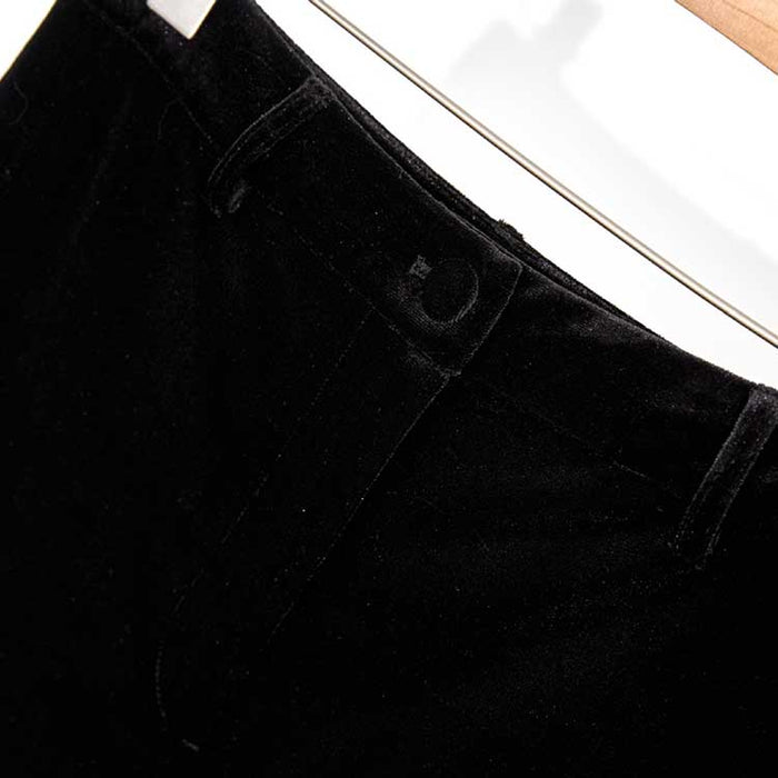 Close-up of black velvet pantsuit for women showcasing soft fabric and sleek design