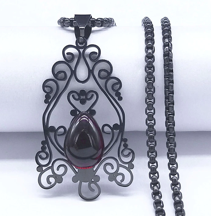 necklace on display with a white background