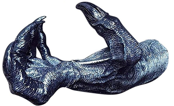 side view of Black witch hand statue