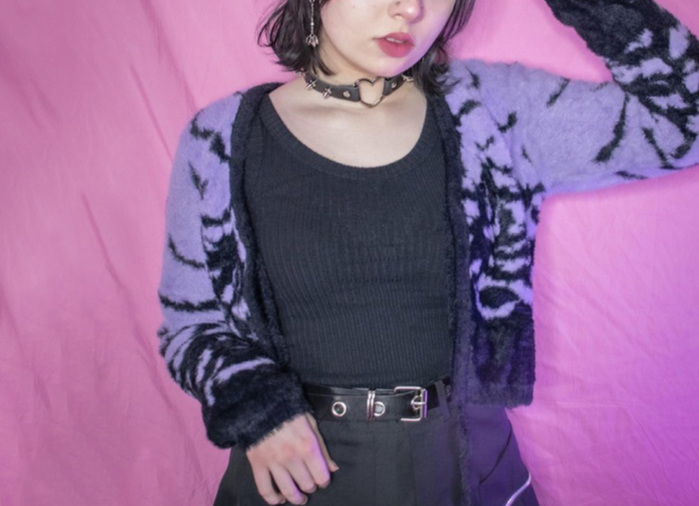Purple cropped short cardigan with black bats design, cardigan ties closed at the front middle
