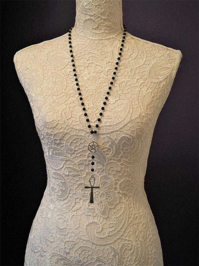 necklace on mannequin