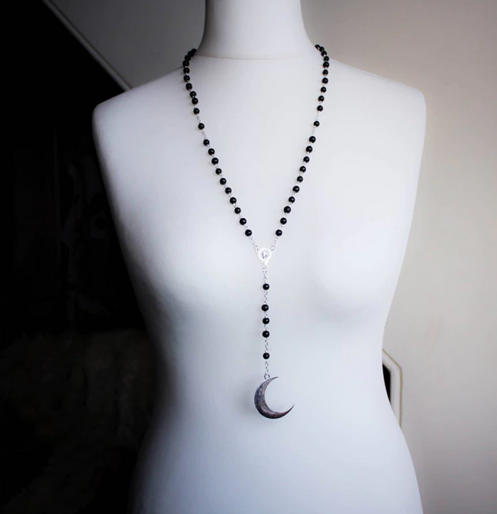 necklace on mannequin