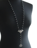 necklace on mannequin