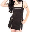 Model wearing a black and white pinstripe dress with zippers on a white background