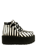 Black and white striped molded 2.5" platform creeper shoe. Shoes have bat wing d ring details with waxed cotton round black laces.