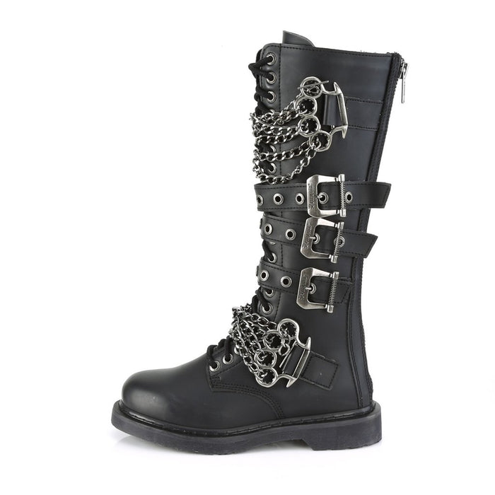 left side view of black vegan leather knee high combat boot with 1.25" heel, 20 eyelet lace-up, brass knuckle with chain on top of shoe and base of shoe with three adjustable straps in the middle, full zipper on backside