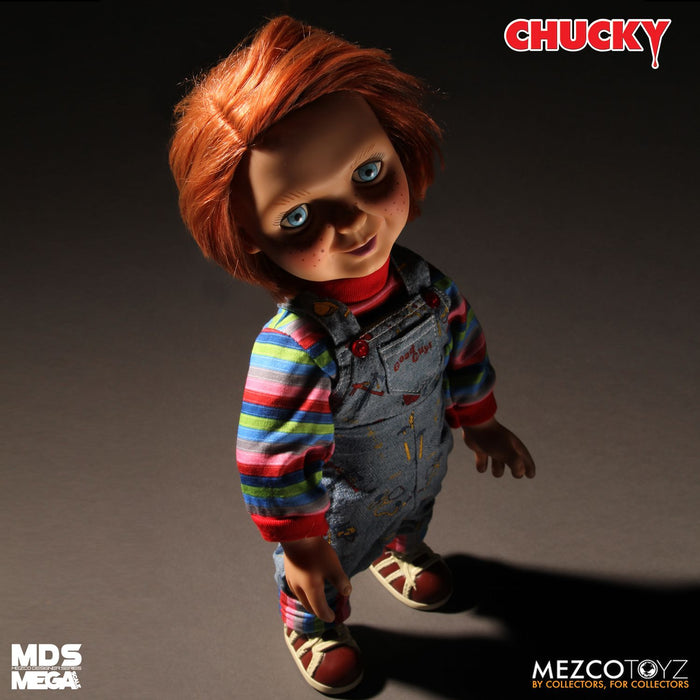 Chucky good guy doll with classic striped shirt and overalls.