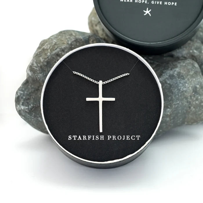 Classic Cross Necklace in Sterling Silver inside the container it comes with | Gifts against human trafficking