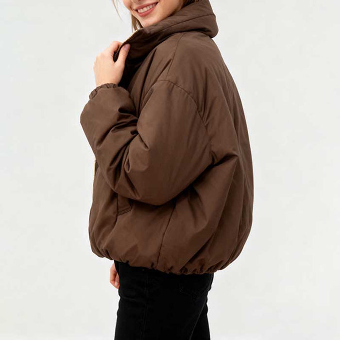 Stylish brown cotton padded winter jacket for women with a cozy hood and elastic hem