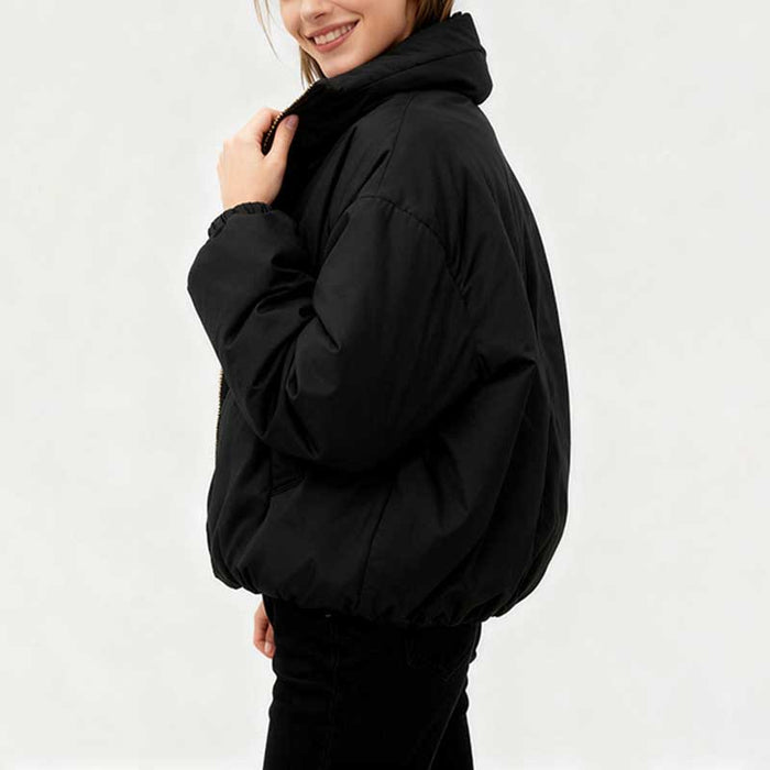 Black cotton padded winter jacket for women with a stylish design and comfortable fit