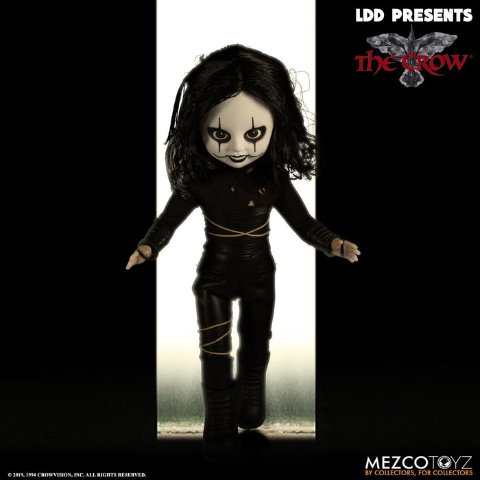 front of doll