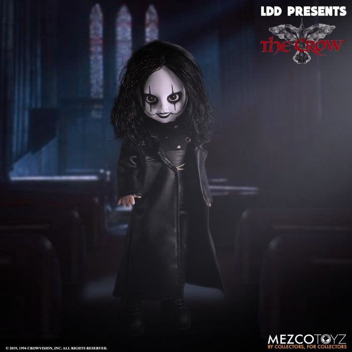 front of doll