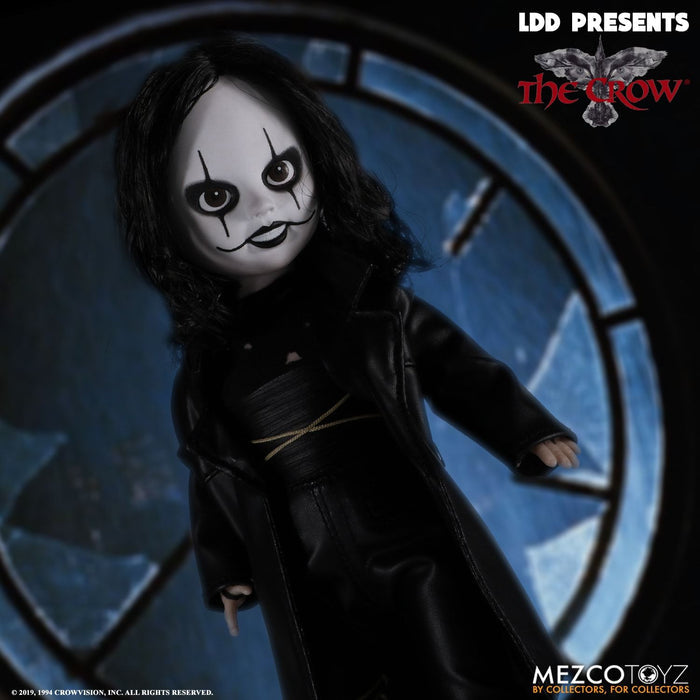 front of doll