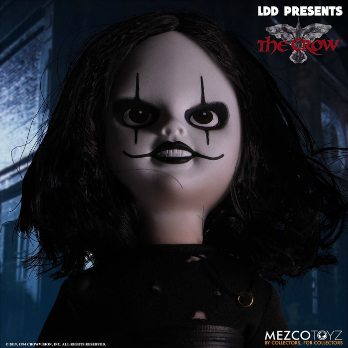 front of doll
