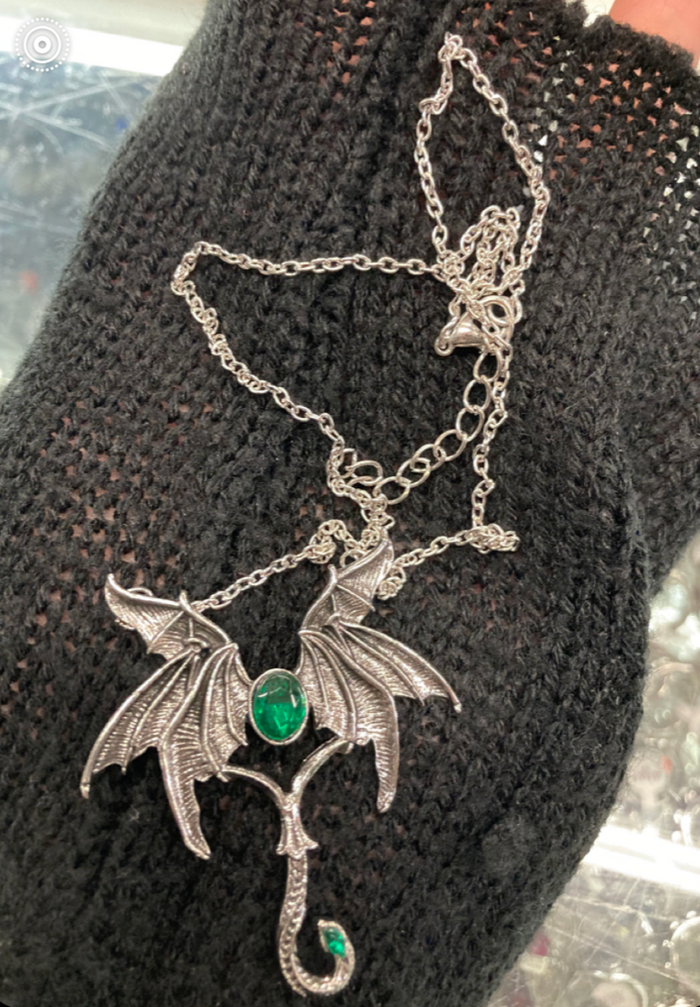 model holding necklace
