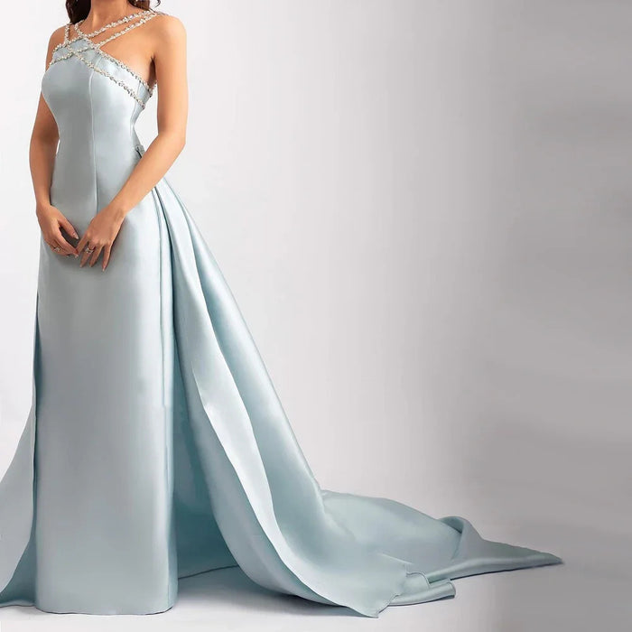 Elegant Light Blue Satin Gown with Rhinestone Embellished Cross Strap Neckline and Flowing Train