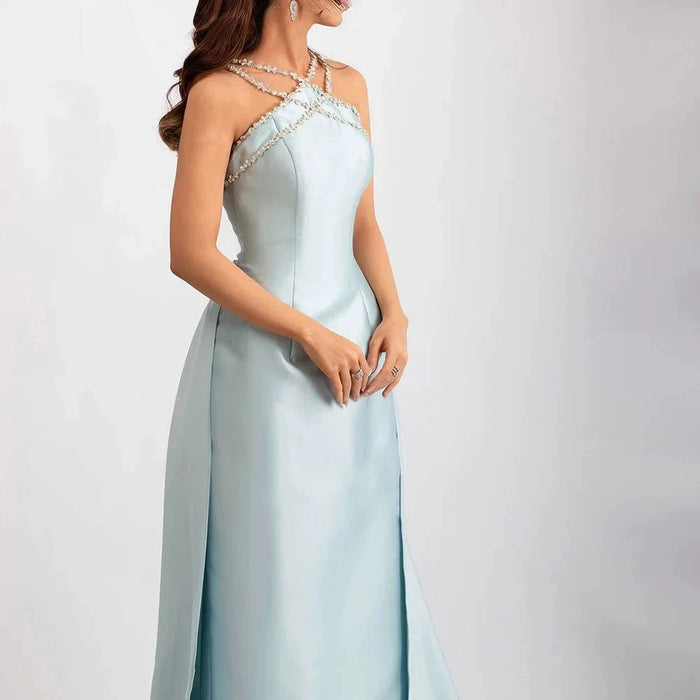 Elegant Light Blue Satin Gown with Rhinestone Embellished Cross Strap Neckline and Flowing Train