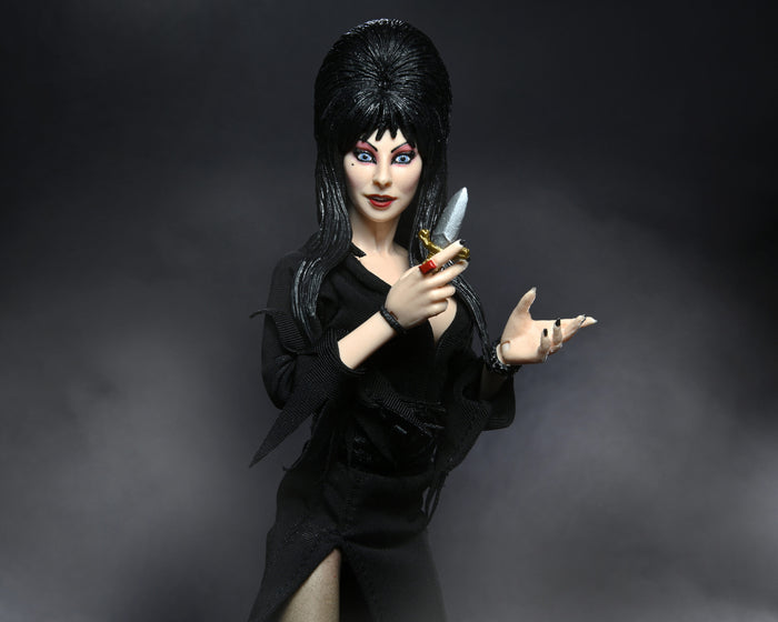 figure on display holding dagger