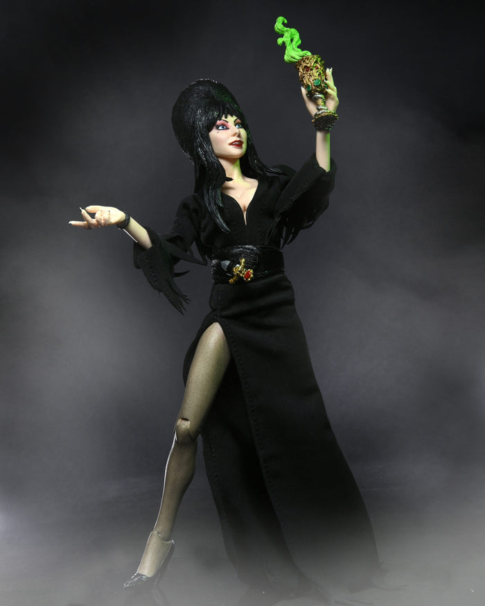 figure on display holding goblet