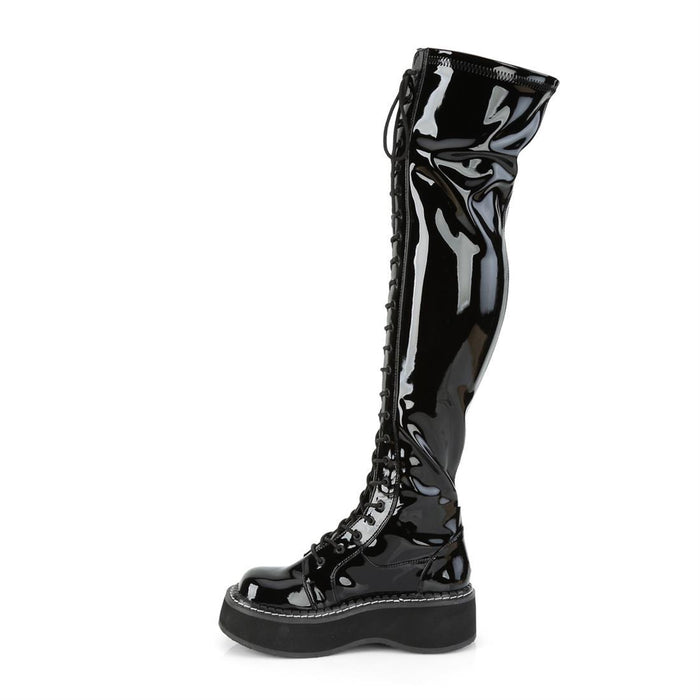 inner view of black patent vinyl 2" platform Straight thigh-high lace-up boot with outer metal zipper