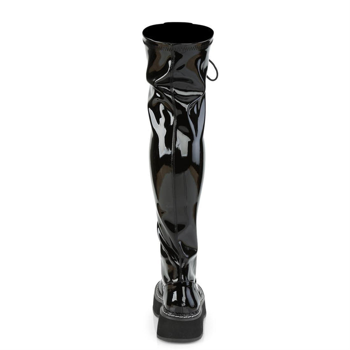 back side view of black patent vinyl 2" platform Straight thigh-high lace-up boot with outer metal zipper