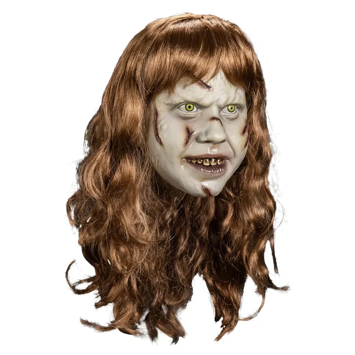 Scary mask with brown hair on a white background