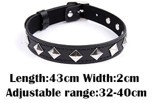 Silver pyramid studs placed with corners up to look like diamond shapes on black vegan leather choker.
