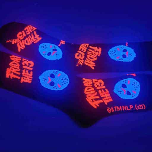 socks on display glowing in the dark