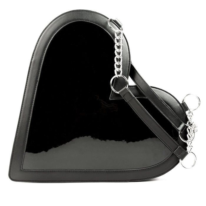 back view of heart shaped glossy black bag with a stitched spiderweb design at the bottom, chain link hardware and faux leather straps.